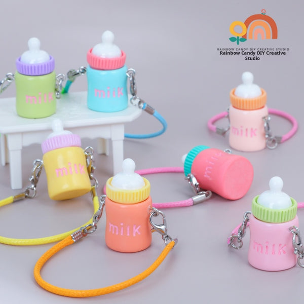 Telefoonversiering met lint en resinhangers